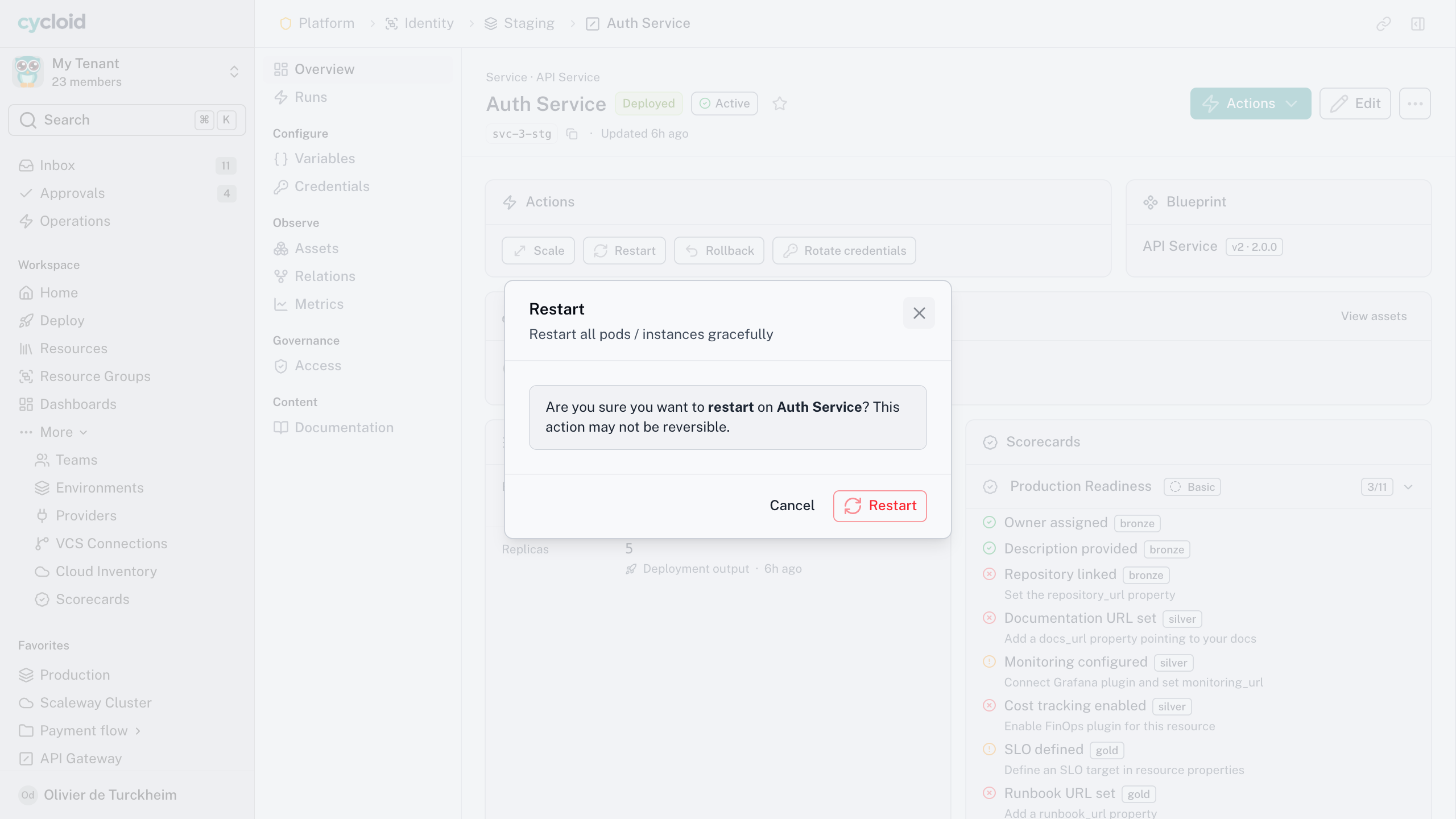 Confirmation dialog for restarting a service in Cycloid, offered alongside scale, rollback and rotate credentials actions.